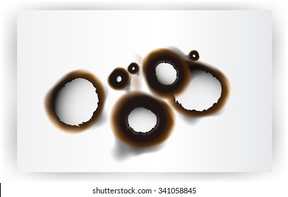 Vector paper with burnt holes of different sizes.