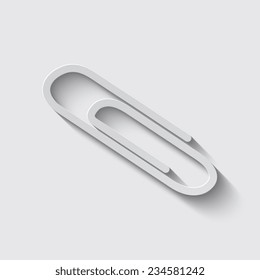 Vector paper clip icon with shadow on a grey background