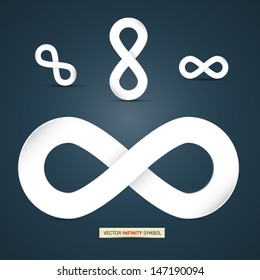 Vector paper infinity symbol on dark blue background 