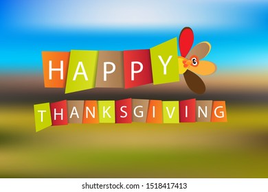 Vector paper letters with text happy thanksgiving isolated on blurred autumn background. With turkey icon.