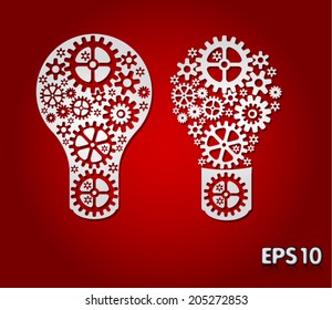 vector paper light bulb with gears and cogs
