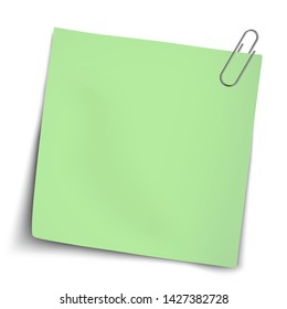 Vector paper mockup of green note attached by metallic paper clip placed on transparent background.