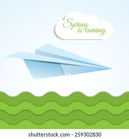 Vector paper origami airplane icon on spring background with clouds and grass . Paper design. Spring is coming lettering.