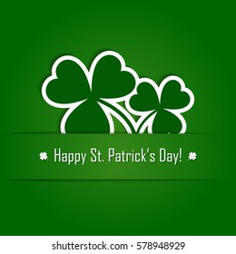 vector paper shamrock on green background