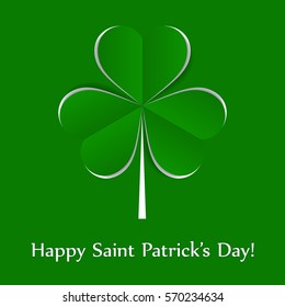 vector paper white shamrock on green background
