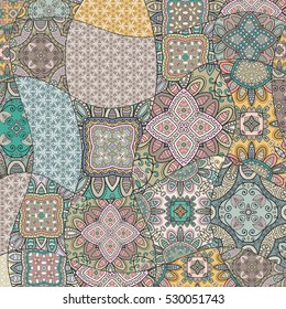 Vector patchwork pattern. Vintage decorative elements. Hand drawn background. Indian, Arabic, Turkish motifs for printing on fabric or paper. Abstract colorful doodle pattern in mosaic style