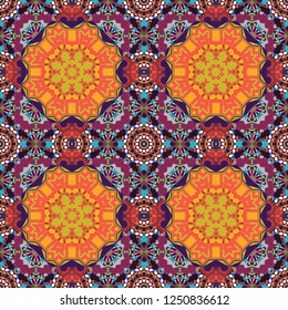 Vector patchwork quilt pattern in orange, brown and purple colors. Abstract colorful mosaic style. Hand drawn seamless pattern. Indian, Arabic, Turkish motifs. Vintage decorative elements.