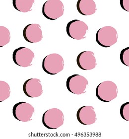 Vector pattern. Abstract background with round brush strokes. Monochrome hand drawn texture. Stylish polka dot in pink color. Hipster design