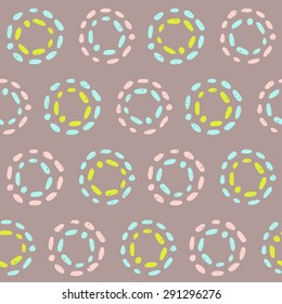 vector pattern of abstract shapes: colorful concentric circles on gray background