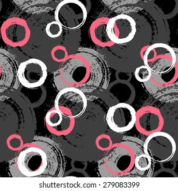 Vector pattern with big bold painted circles and bubbles. Colorful hand drawn print for summer fall fashion with random round shapes in 1950s style. Bright pink color on black and white background
