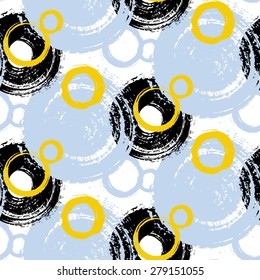 Vector pattern with big bold painted circles and bubbles. Colorful hand drawn print for summer fall fashion with random round shapes in 1950s style. Gold yellow color on black and white background