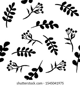 Vector pattern of black leaves and branches on a white background. 