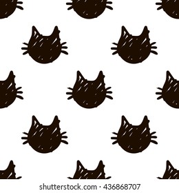 vector  pattern of black silhoutte  cats head on white background