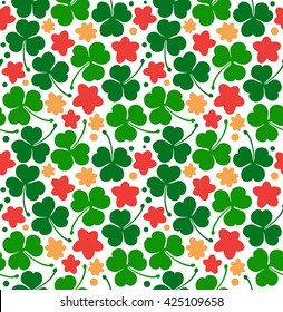 vector pattern with clovers, trefoils. St. Patrick's day texture. Decorative floral background with flowers
