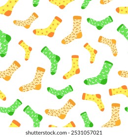 Vector pattern with colorful cute yellow, orange, green socks