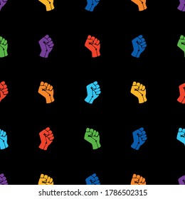 Vector pattern with colorful fists on black background. Symbol of the LGBT community, a rainbow fists.