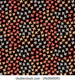 Vector pattern with crosses on a dark background. Orange, gray crosses for printing on fabric and wrapping paper.