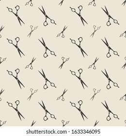 Vector pattern of dark gray scissors on a beige background