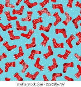 Vector pattern with different Christmas socks. Seamless pattern for cards, wrapping papers, posters and fabric.