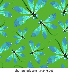Vector pattern with dragonflies on green background. Seamless pattern can be used for wallpaper, pattern fills, web page background,surface textures.