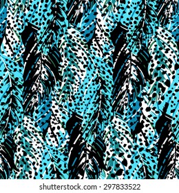 Vector pattern inspired by tropical birds, parrots wings. Seamless feather texture hand drawn in blue, black, white colors with splattered dots. Bold print for winter fall fashion