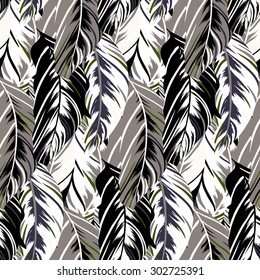Vector pattern inspired by tropical birds and nature, parrots wings, leaves. Seamless feather texture hand drawn in dark neutral colors with lines and stripes. Bold print for winter fall fashion
