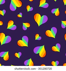 Vector pattern with many colorful rainbow emblems of hearts on dark blue background. Seamless pattern can be used for wallpaper, pattern fills, web page background,surface textures.