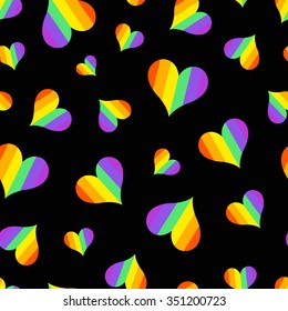 Vector pattern with many colorful rainbow emblems of hearts on black background. Seamless pattern can be used for wallpaper, pattern fills, web page background,surface textures.