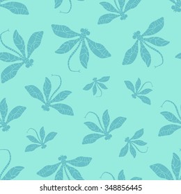 Vector pattern with many dragonflies on light blue background. Seamless pattern can be used for wallpaper, pattern fills, web page background,surface textures.