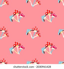 vector pattern with mushrooms-fly agaric in a flat modern style on a pink background. Pattern for Halloween, postcards, T-shirts, fabrics, packaging