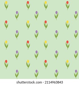 Vector pattern of red, yellow and purple tulips on a transparent or green background. Spring print for textiles and decor.