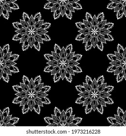The vector pattern is seamless from a geometrically arranged mandala. Ethnic decorative pattern of floral contour round stylized flower mandala with white line on black background for pattern design