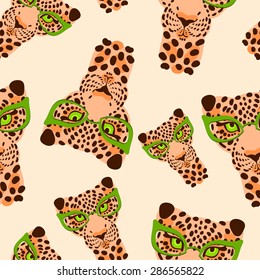 vector pattern, seamless Wallpaper with a picture of the muzzle of the leopard in trendy glasses