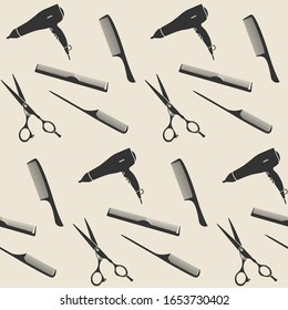 Vector pattern of silhouettes of hairdressing scissors, combs, hair dryer on a beige background