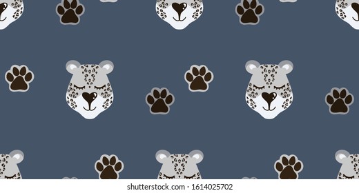 Vector pattern with snow leopard head and paw prints. Seamless pattern for bed linen, wrapping paper, fabric. Vector illustration on dark blue background