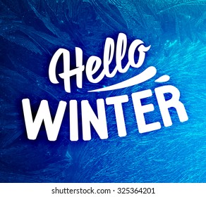 Vector Patterns Made by the Frost. Blue Winter Background for Christmas Designs. Xmas Typographic Label for Holiday Greeting Cards, Party Banners and Posters. Icy Abstract Background.