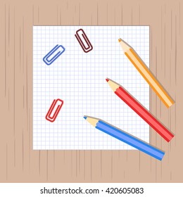 vector pencil, paper clip, sheet of paper on wooden background