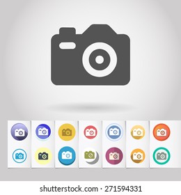 Vector photo camera icon and big set of round flat web mobile buttons on paper background