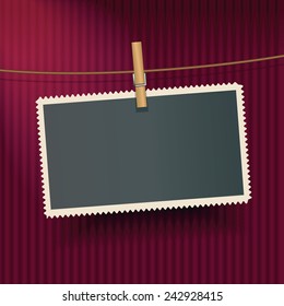 Vector photo frame hanging on the red curtain