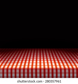Vector picnic table covered with tablecloth on dark background.