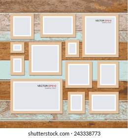 Vector picture frame on vintage wooden wall. Background for photo art gallery.