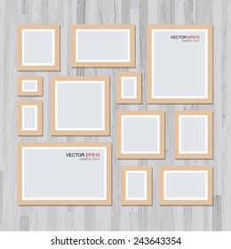 Vector picture frame on vintage wooden wall. Background for photo art gallery.