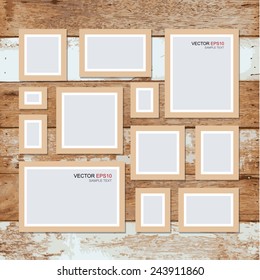Vector picture frame on vintage wooden wall. Background for photo art gallery.