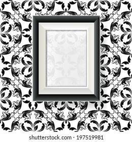 Vector picture frame on a wall with damask wallpaper