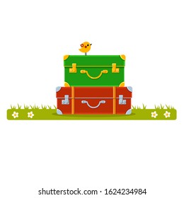 Vector pile of two suitcases with a bird on a grass. Travelling. Summer holidays. Bright baggage. Cute cartoon laggage. Tourist elements.