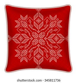 Vector pillow with embroidered pillowcase. Traditional Scandinavian ornament for Christmas - bright red and white snowflakes in cross stitch pattern. Vector illustration.