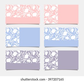 Vector pink, blue and purple business cards with floral pattern.