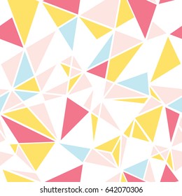 Vector pink, blue and yellow triangles abstract seamless repeat pattern design. Great for modern fabric, wallpaper, scrapbooking, giftwrap, packaging projects.