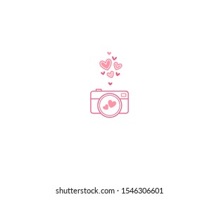 Vector pink camera icon with hearts isolated on white background. Stylized photo camera for Valentine greeting card, line art icon, romantic symbol. Decor for greetings on 14 Febriary, Valentine Day