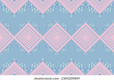 Vector of pink diamond geometric on blue background. Seamless pattern for fashion, cloth, textile, carpet, wrapping paper.